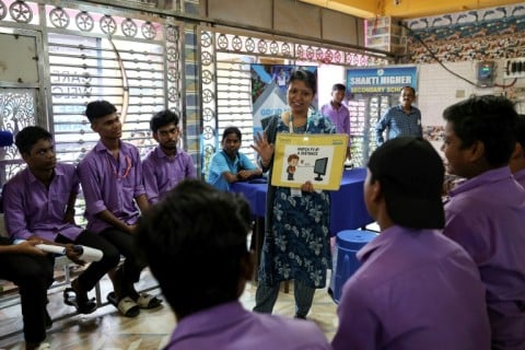 Students attend an eye care awareness session conducted by GoodVision India – Care Netram charity inside the Shakti Higher Secondary School in Cuttack