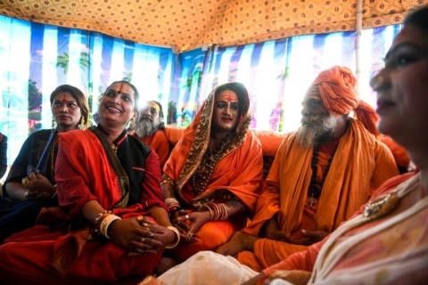 The head of the Kinnar Akhara monastic Hindu order, Laxmi Narayan Tripathi (centre), at the Kumbh Mela religious festival in Allahabad, India in 2019