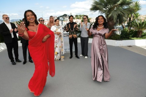Kinnars come to Cannes: Nepalese actress Jasmine Bishwokarma (left) leads the dance as the cast of "Elephants in the Fog" charm the French film festival