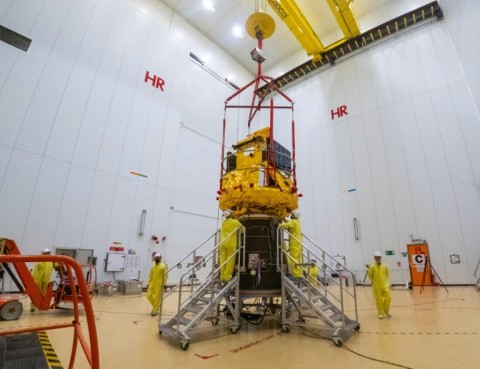 The Smile spacecraft, in gold, fixed to a Vega-C rocket adaptor at the launch site in Kourou, French Guiana