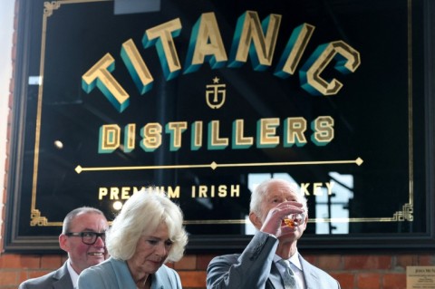 Charles and Camilla sample whiskey during a visit to Titanic Distillers in Belfast, Northern Ireland