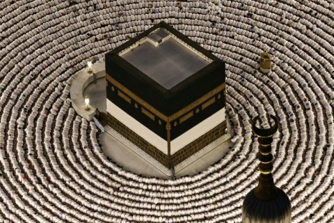 Muslims at Mecca's Grand Mosque perform the evening prayer around the Kaaba, Islam's holiest shrine, ahead of the annual hajj