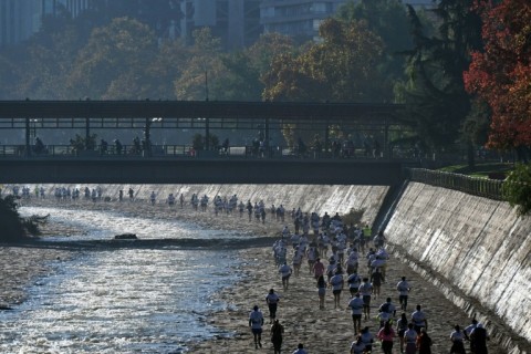 Runners took part in a race along the banks of the Mapocho River to celebrate its resoration