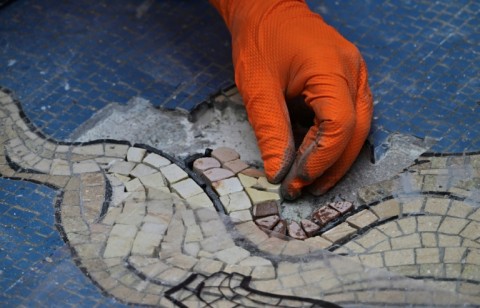 'It's probably a charming gesture, but also quite damaging for a work of art,' said restorer Gianluca Galli of the tradition