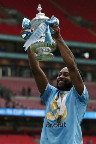 Antoine Semenyo holds aloft the FA Cup. His goal secured Manchester City a 1-0 win over Chelsea at Wembley