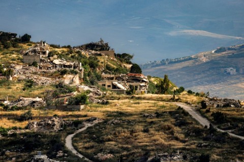 Destroyed buildings are pictured in the village of Odaisseh in southern Lebanon as seen from across the border in the Upper Galilee region of northern Israel on May 29