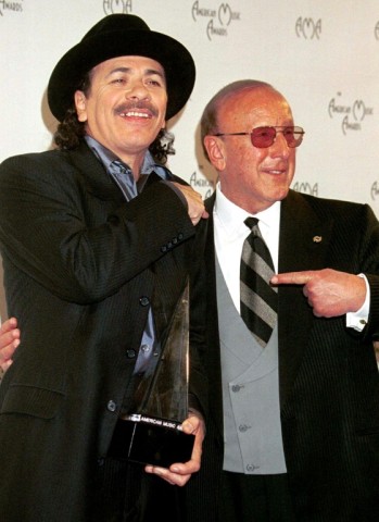 Carlos Santana (L) was another of Clive Davis' proteges