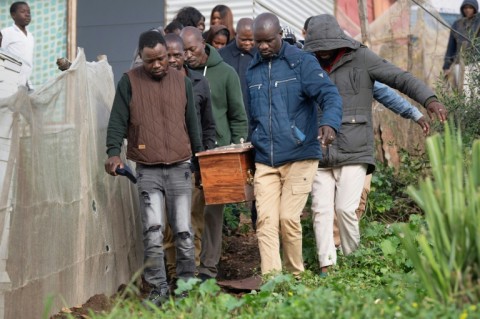 A 19-year-old South African was also stabbed to death on the night the two Mozambicans were killed