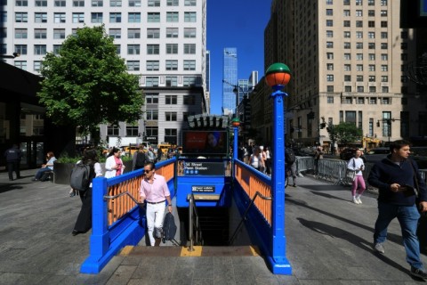 A subway station near Madison Square Garden has been painted in Knicks blue and orange