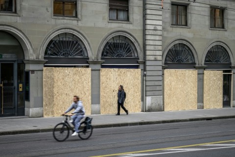 Some facades have been boarded up in Geneva in anticipation of protests surrounding the G7 summit in Evian