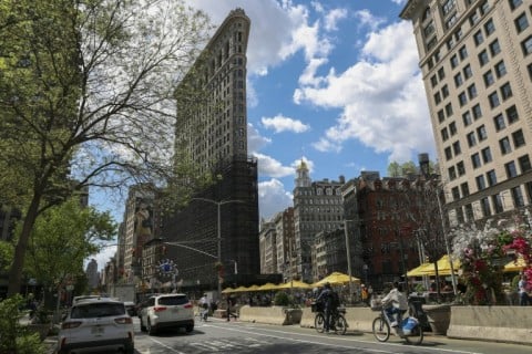 The Flatiron Building is seen as scaffolding removal began during its conversion from office to residential use in New York in April 2026