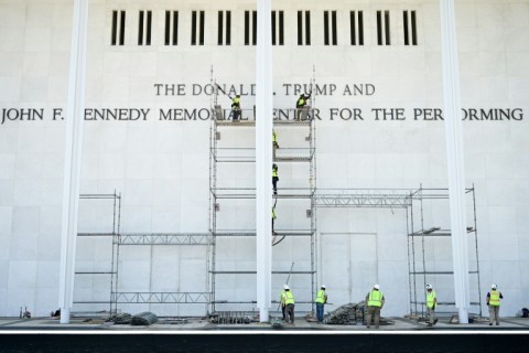 A crew erects scaffolding at the Kennedy Center in Washington, ahead of work to remove President Donald Trump's name from the building's facade