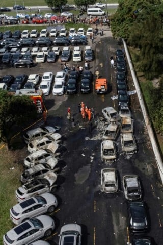 The helicopters fell into an electric car parking lot after colliding