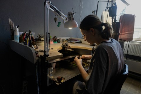 Small drone-themed pendants are popular among civilians