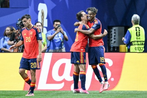 Spain's Lamine Yamal (right) celebrates with teammates after opening the scoring in a 4-0 thrashing of Saudi Arabia