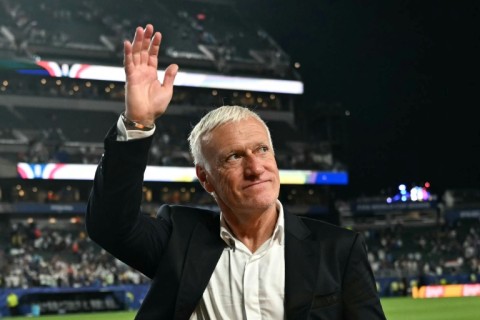 France coach Didier Deschamps waves to fans at the end of Monday's game in Philadelphia