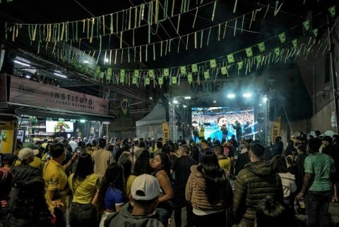 Brazil fans in the Heliopolis favela in Sao Paulo watched the game against Haiti in team jerseys and regular street clothes