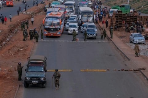 Police shut down key roads into the central business district