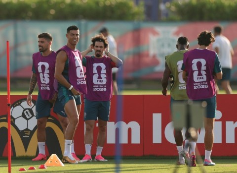 Portugal's players prepare for their crucial Group K decider with Colombia