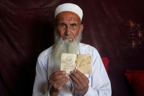 Murat Khan Safi said he made 'difficult decisions' to pay the $7.80 for each of his relatives to process a new ID card