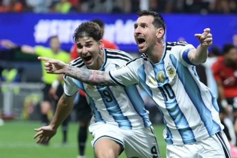 Lionel Messi celebrates scoring Argentina's second goal