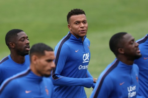 Mbappe with his teammates during a training session at France's World Cup base near Boston