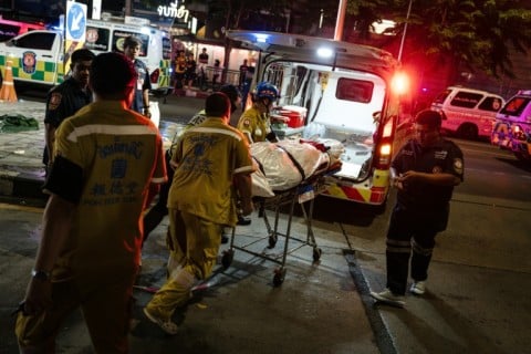 An AFP journalist saw several body bags on the ground outside the Rong Beer Na Lat Phrao bar and restaurant early Monday morning.