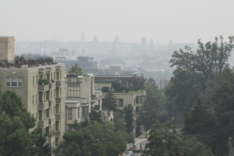 View of downtown Washington, seen from Malcolm X Park, on July 17, 2026 as smoke from Canadian wildfires engulfs the US capital