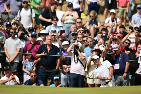 Rory McIlroy is battling to make the cut at the British Open