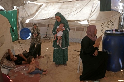 Health officials said it is difficult to isolate patients with chickenpox because many people are crammed into small tents