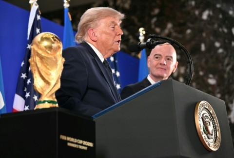 US President Donald Trump with FIFA chief Gianni Infantino at a reception at Trump Tower in New York
