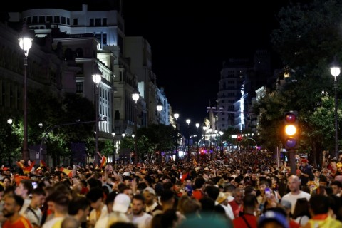 Spain's supporters celebrate after the 2026 World Cup final match between Spain and Argentina at Cibeles square and Gran Via avenue in Madrid