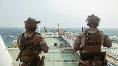 This handout photograph taken on July 16 by US Central Command Public Affairs shows US Marines from the 11th Marine Expeditionary Unit conducting a verification boarding aboard the M/T Wen Yao in the Gulf of Oman