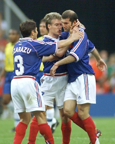 Zidane (R) scored an unlikely double with two headers as he inspired France to their first ever World Cup crown