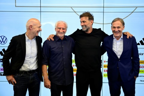 The vice-president of the German Football Association (DFB), Hans-Joachim Watzke (R), says FIFA's plans are an attack on football