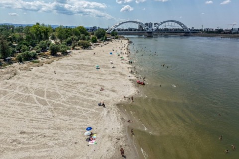 The shrinking waterway has revealed makeshift beaches, embraced by locals
