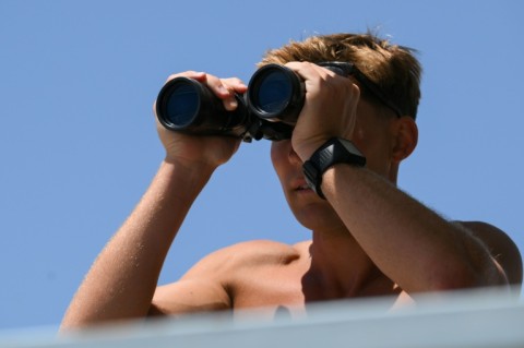Lifeguard Maximus Oberto said the pace of rescues on some weekend days has been 'pretty hectic'