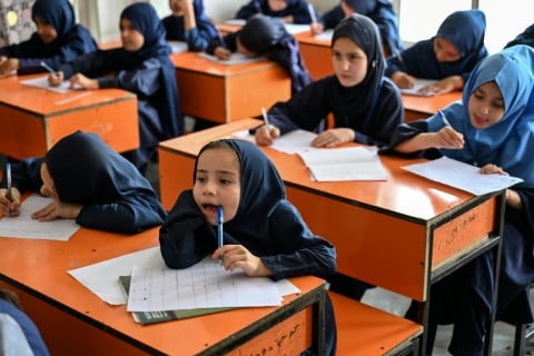 Best days of their lives: Afghan girls taking their midterm exams at a primary school in Kabul