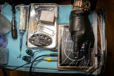 Tools and equipment used by scalp tattoo artist Remy as at his studio in Ginowan