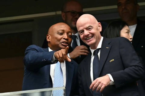 Infantino can still count on the support of Confederation of African Football (CAF) President Patrice Motsepe (L)
