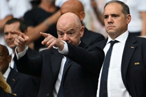 CONCACAF President Victor Montagliani (R) is viewed as a potent threat to Infantino were he to run for FIFA chief