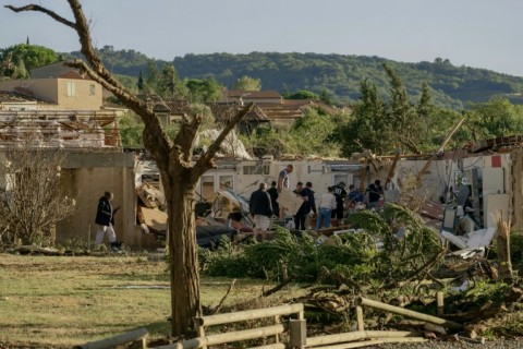 Some houses had their roofs torn off