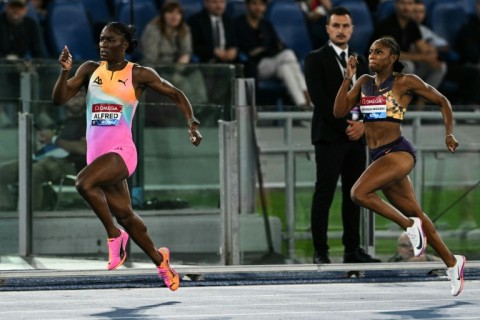 Saint Lucia's Julien Alfred (L) and American Melissa Jefferson-Wooden