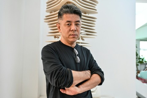 Chinese architect and founder of MAD Architects Ma Yansong poses for a photograph in Beijing on August 7, 2026. Over the past two decades, Ma has created dozens of visually striking projects in his home country and abroad, integrating nature with sleek, modern designs.