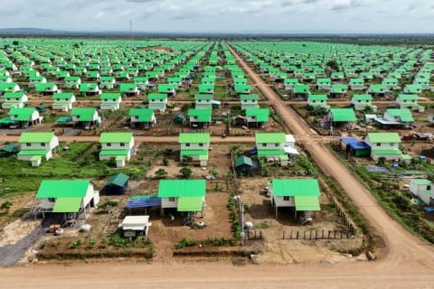 The white stilted houses with their cheerful green zinc roofs are surrounded by a small patch of land to grow vegetables