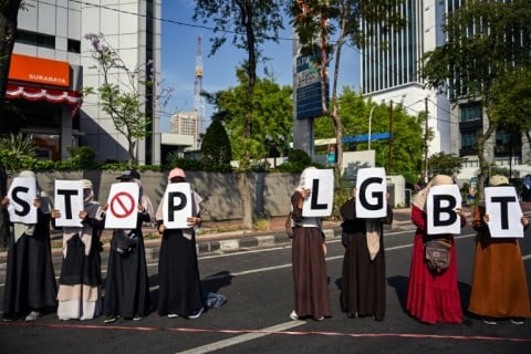 Protesters take part in an anti-LGBTQ rally organised by pro-Islamic organisations in Surabaya on August 9, 2026