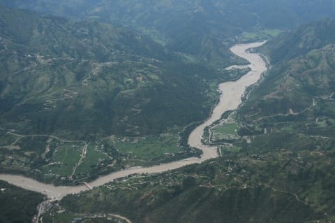 An aerial view taken from inside a commercial aircraft shows Trishuli river in Nepal's Dhading district on September 1, 2026 in the aftermath of flash floods