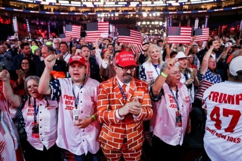 Attendees cheer after the US national anthem was performed during the first day of the Republican National Midterm Convention at the American Airlines Center in Dallas, Texas on September 9, 2026