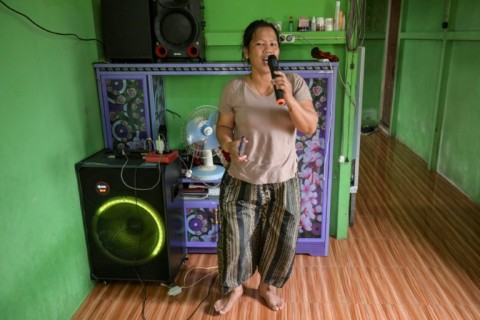 Borneo Future Indonesia wildlife observer Katarina Siti bought a karaoke machine with the money earned from observing wildlife