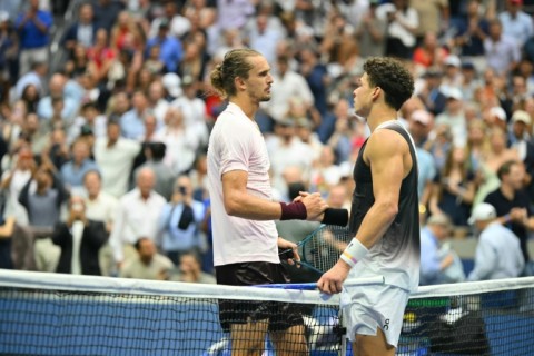 Ben Shelton and Alexander Zverev shake hands at the net after Zverev's victory in the US Open final